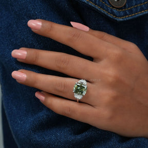 In Finger Front View Of Green Cushion Cut Moissanite 3 Stone Ring