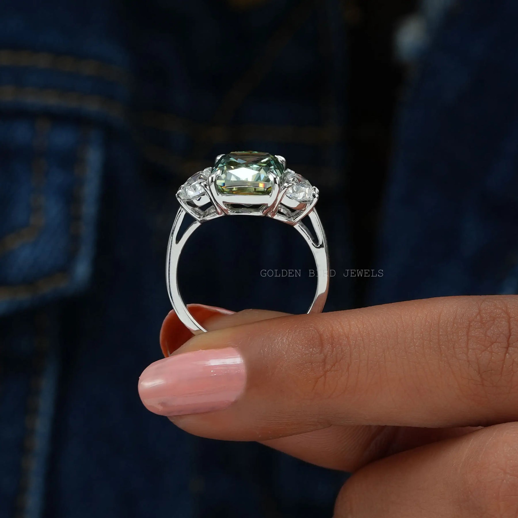 Adjustable emerald green stone platinum ring lined with cz -