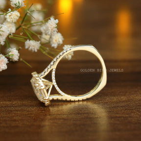 Emerald And Baguette Moissanite Halo Engagement Ring In Yellow Gold