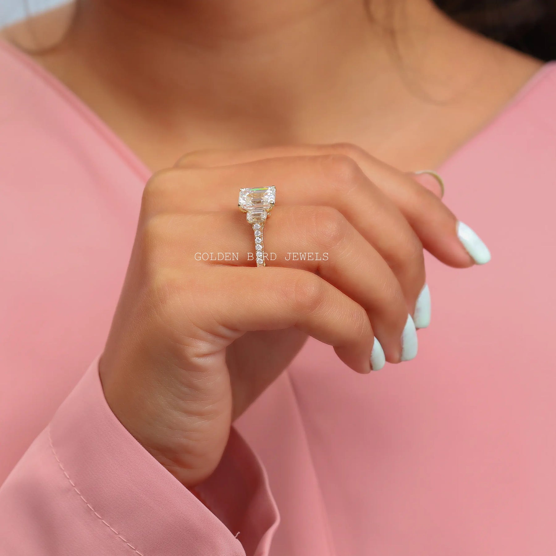 In Finger Side View Of 3 Stone Moissanite Engagement Ring