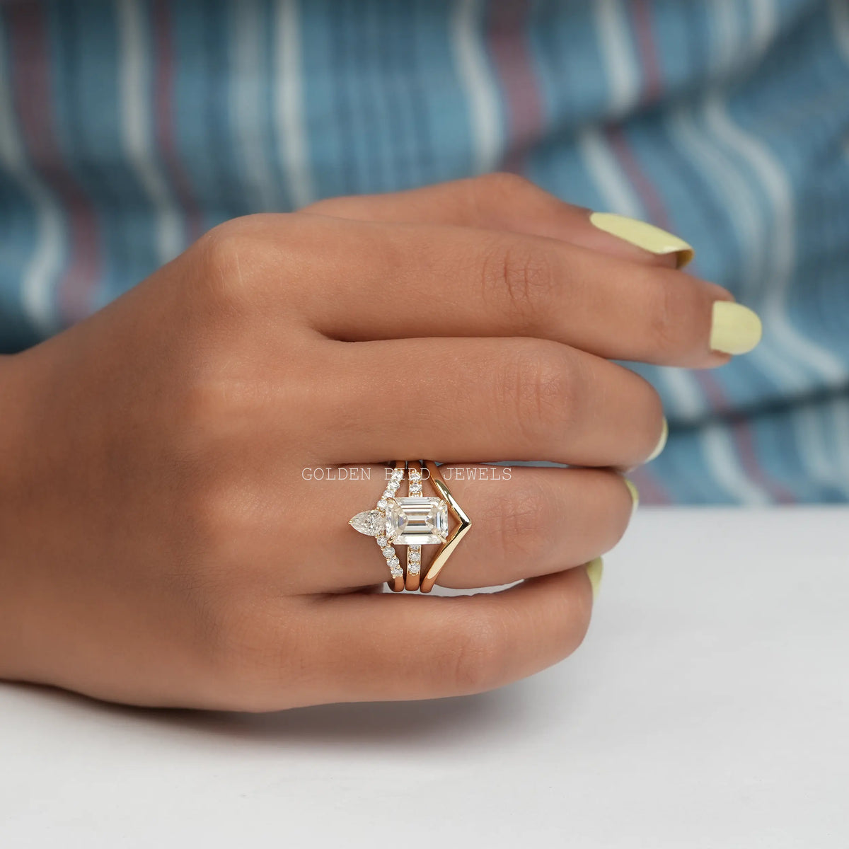 View of Miossanite Emerald Cut Bridal Ring Set Made In 14k Yellow Gold