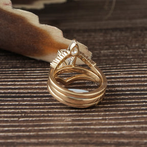 View of Moissanite Bridal Ring Set Made Of Curved Band In Yellow Gold