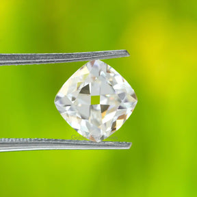 In Tweezer Front View Of Colorless French Cushion Cut Moissanite Diamond