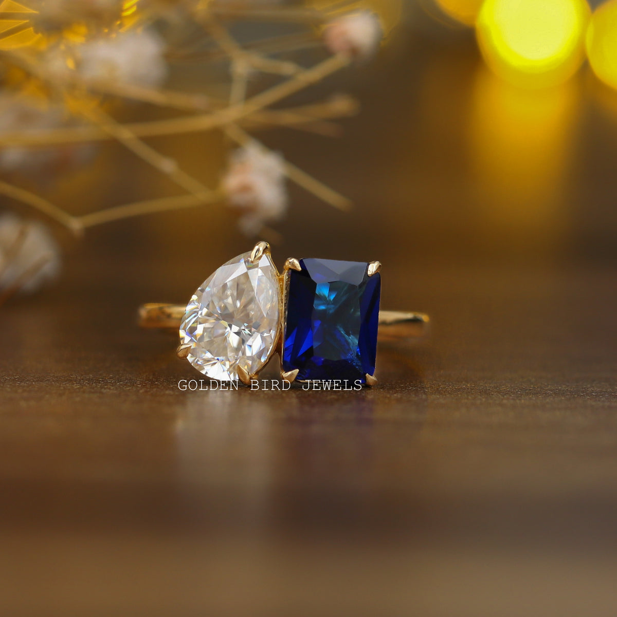 View of Emerald & Pear Cut Toi Et Moi Engagement Ring In Yellow Gold
