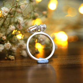 Back view of a pear-cut  ring in prongs setting 