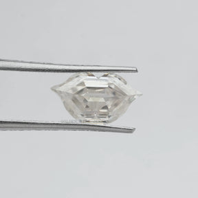 Twijer holding the Lips Cut Moissanite Antique Loose Stone