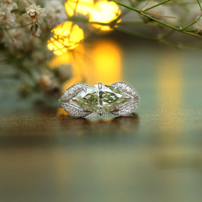 Mint Green Marquise Cut Moissanite With Colorless Round Cut Moissanite Side Stone Vintage Engagement Ring