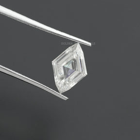 in tweezer front view of modified and antique marquise cut moissanite stone