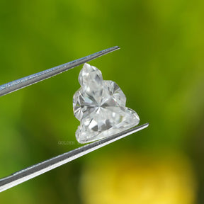 View of Buddha Cut Moissanite In White
