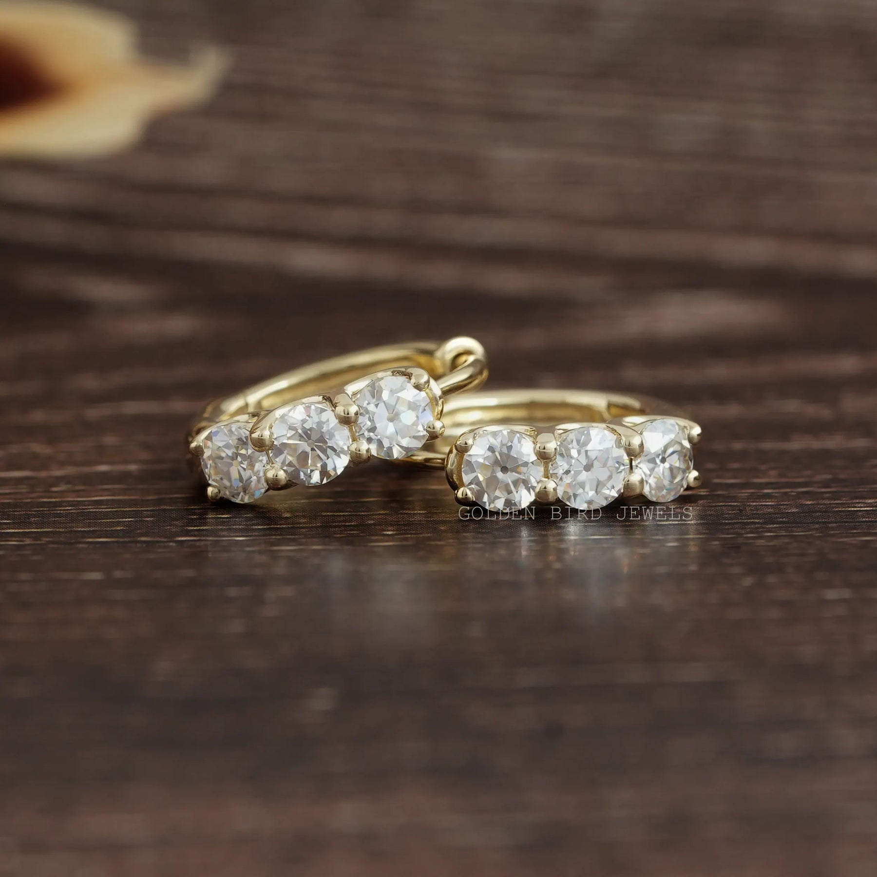 [This OEC round moissanite earrings made of yellow gold]-[Golden Bird Jewels]