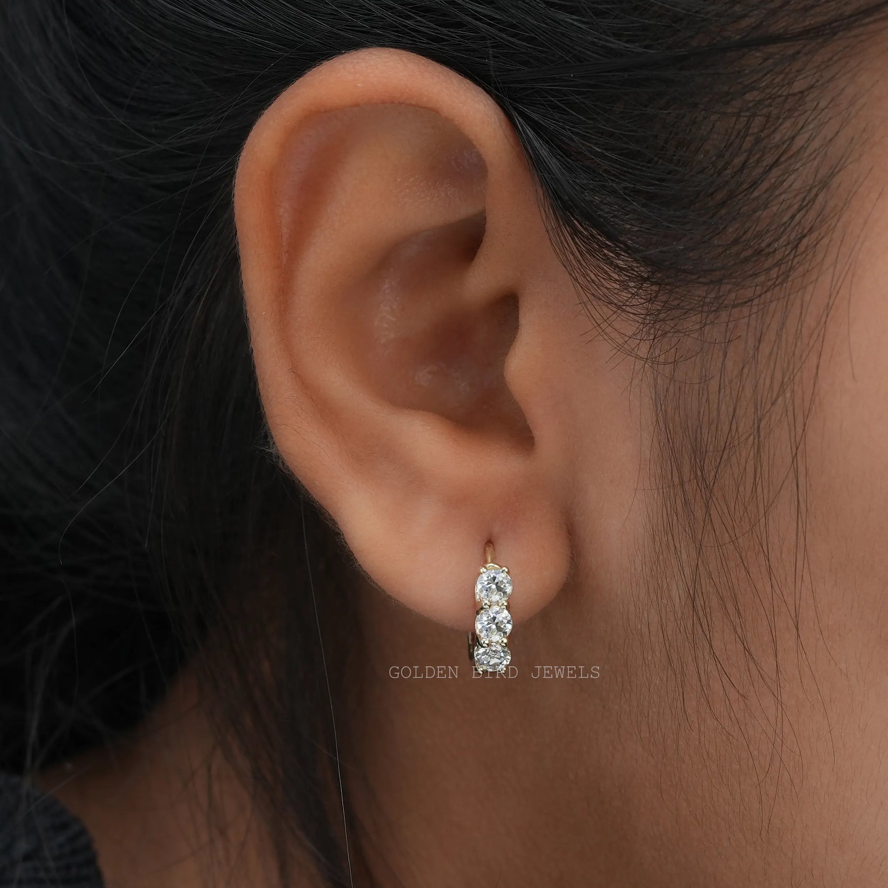[In ear front view of old european round cut moissanite yellow gold earrings]-[Golden Bird Jewels]