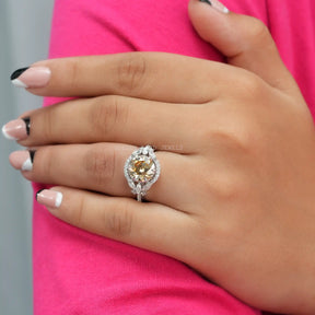 [Old european round cut moissanite ring set in halo style setting]