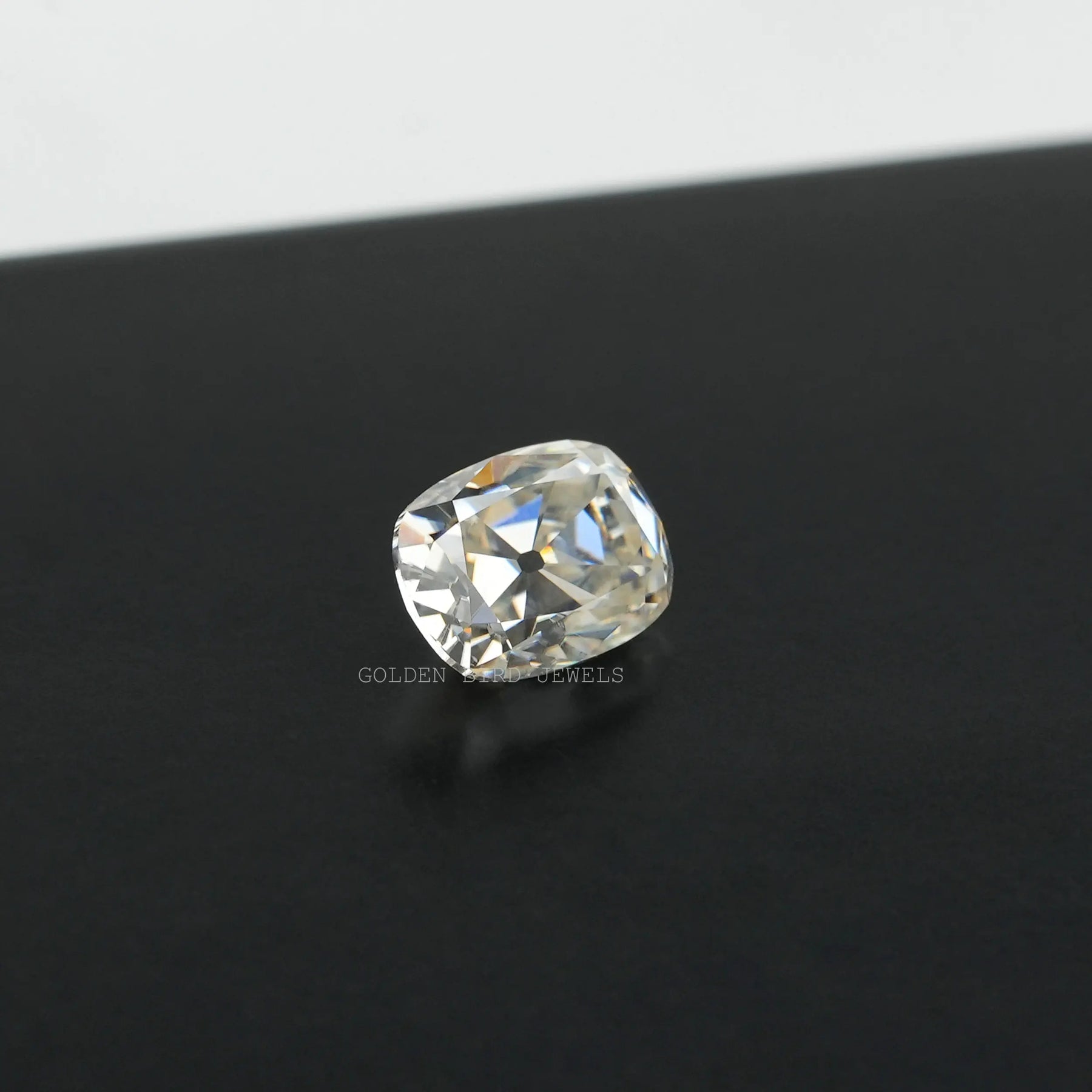 Side View Of 1.22 Carat Off White Old Mine Cushion Cut Loose Moissanite Stone