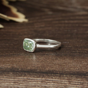 Left Side View Of Old Mine Cushion Cut East West Bezel Set Moissanite Engagement Ring