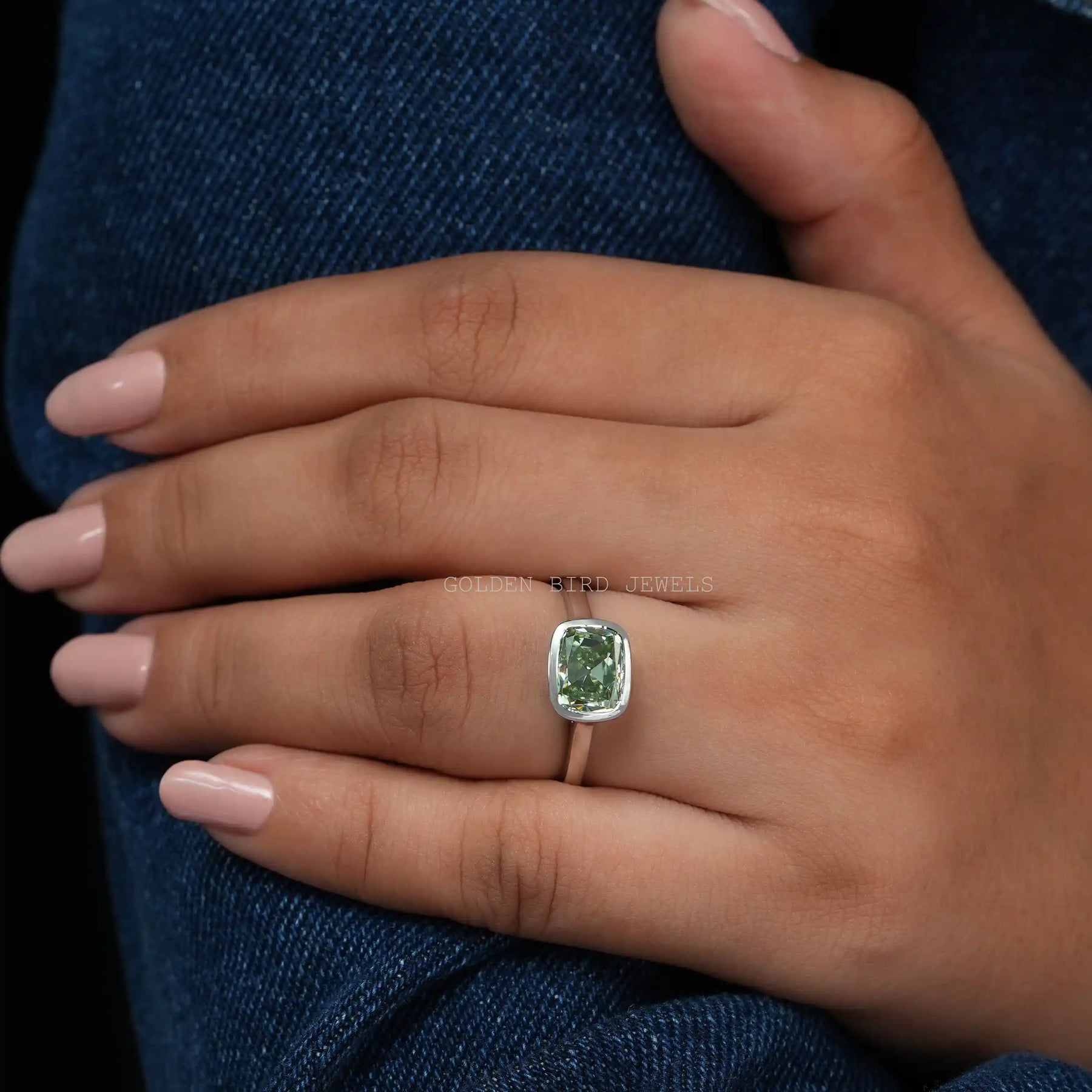 In Finger View Of East West Bezel Set Mint Green Old Mine Cushion Cut Moissanite Solitaire Ring