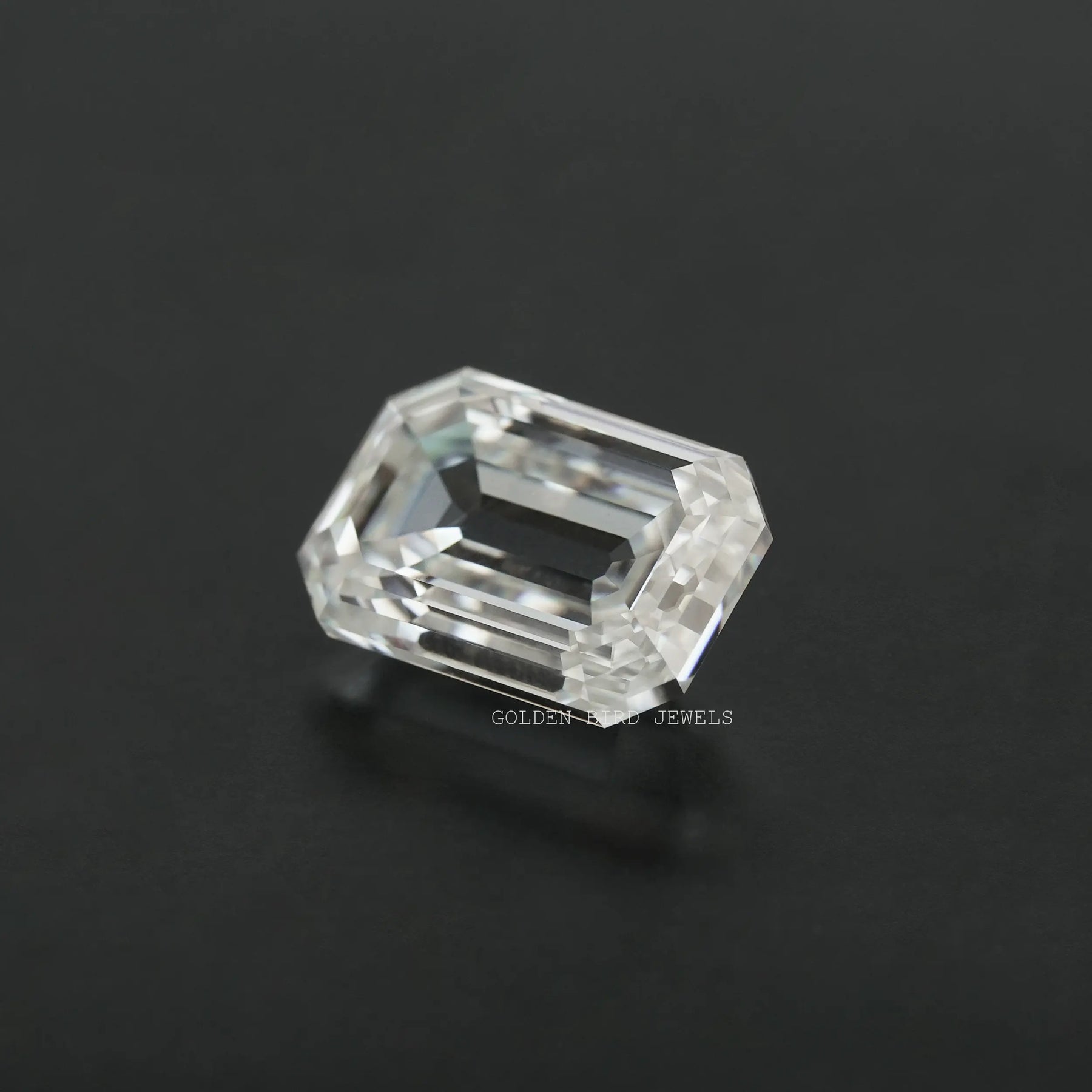 side look of old mine emerald cut moissanite stone