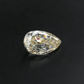 right side view of vintage old mine cut pear shape loose moissanite stone