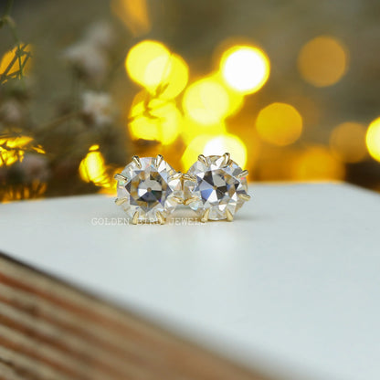 Front view of european shaped moissanite stud earrings