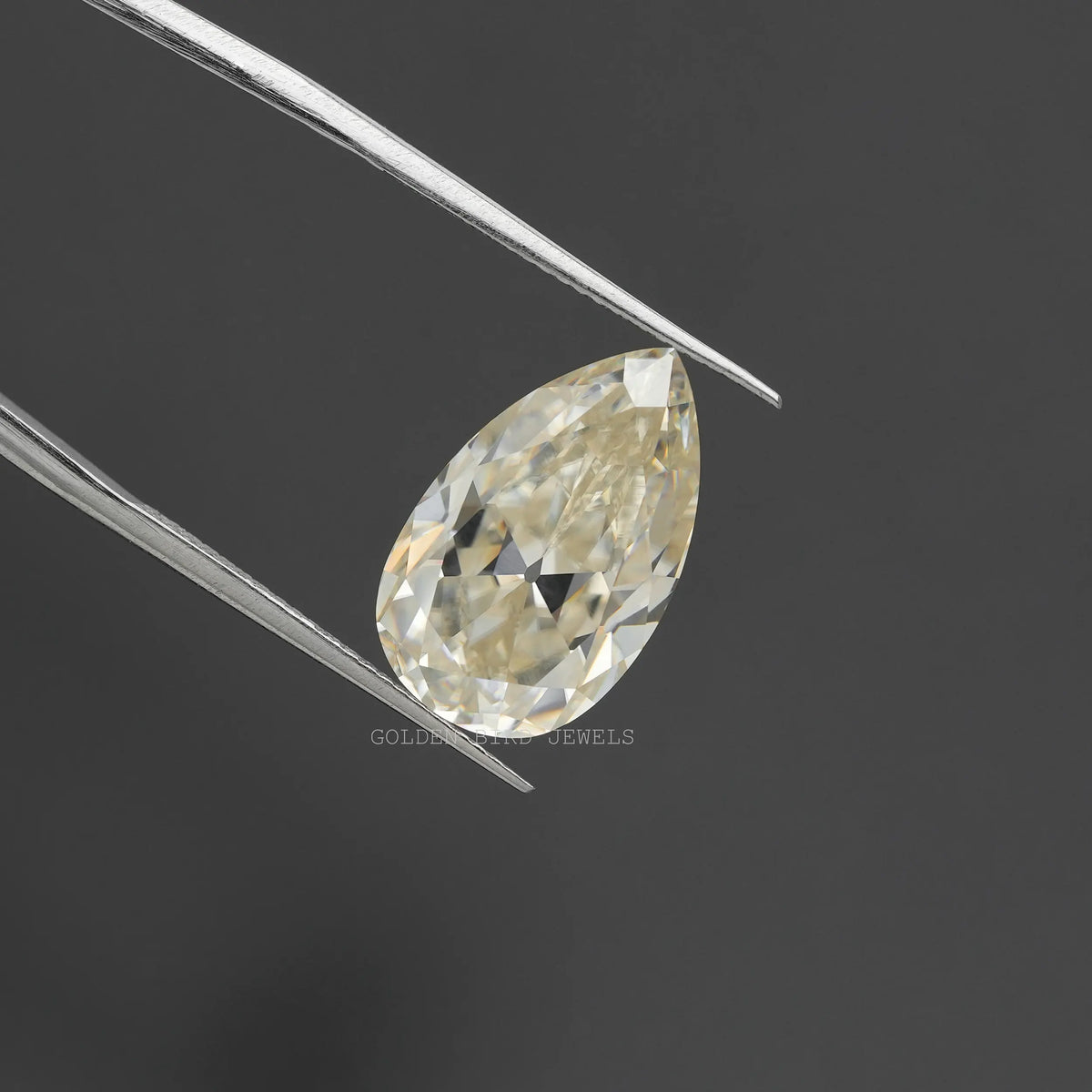 In tweezer 8.11 CT Old Mine Pear Cut Lab Grown Moissanite Stone