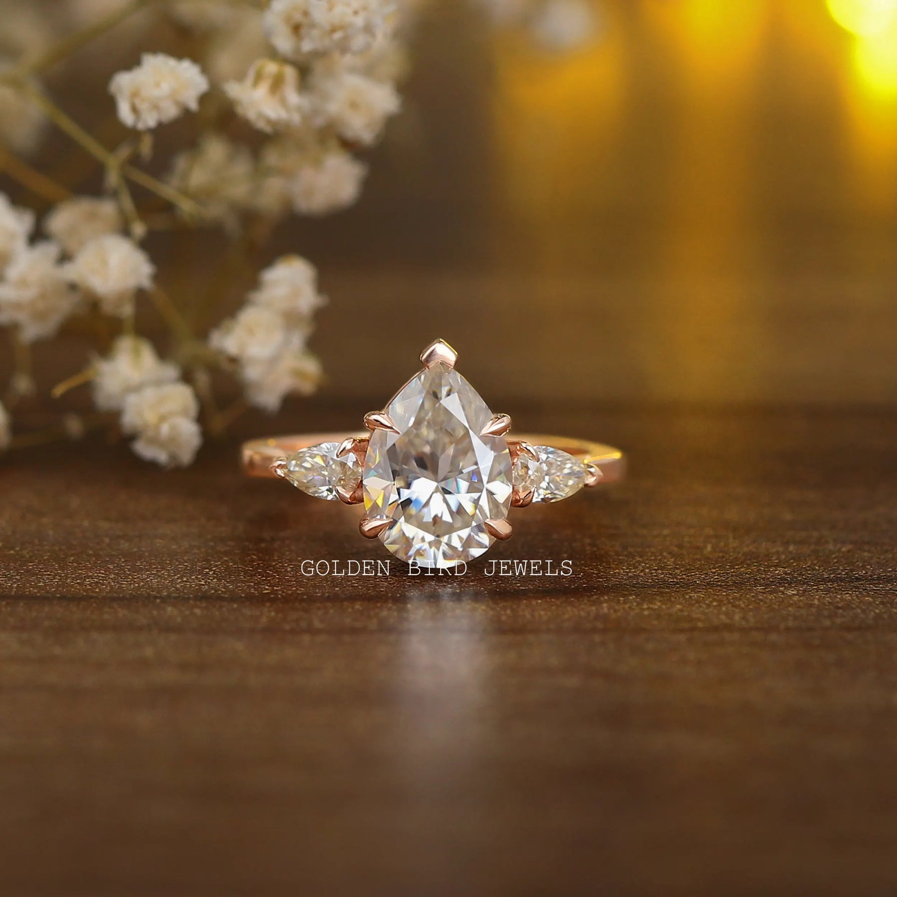 3 Carat Colorless Pear Cut Moissanite Three Stone Engagement Ring