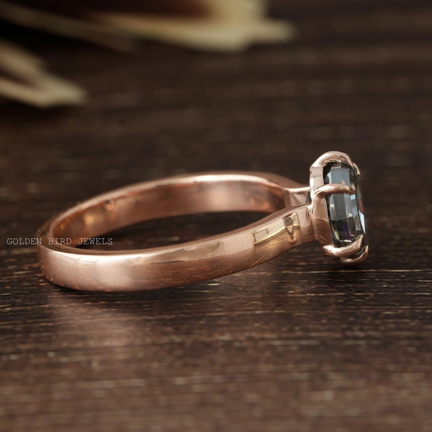 Side View Of Fancy Color Step Cut Moissanite Solitaire Engagement Ring Made In Solid Rose Gold