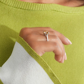 In Finger Side View Of Step Cut Oval Double Prong Moissanite Engagement Ring