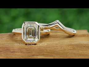 [YouTube Video Of Emerald Cut Moissanite Solitaire Bezel Set Ring With Curved Band]